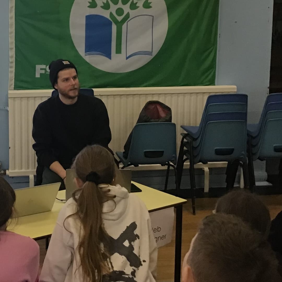 photo of calum talking to children about his job at radiator digital